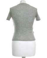 387513 Tops et t-shirts BERSHKA Occasion Vêtement occasion seconde main