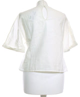 388578 Tops et t-shirts MANGO Occasion Vêtement occasion seconde main