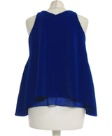 397122 Tops et t-shirts MANGO Occasion Vêtement occasion seconde main