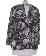 406993 Tops et t-shirts MANGO Occasion Vêtement occasion seconde main