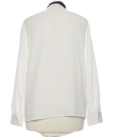 412612 Chemises et blouses MANGO Occasion Vêtement occasion seconde main