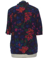 426168 Chemises et blouses MANGO Occasion Vêtement occasion seconde main