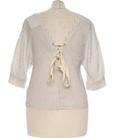 430722 Tops et t-shirts MANGO Occasion Vêtement occasion seconde main
