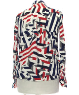 443508 Chemises et blouses TOMMY HILFIGER Occasion Vêtement occasion seconde main