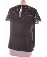 450174 Tops et t-shirts MANGO Occasion Vêtement occasion seconde main