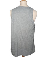 514658 Tops et t-shirts PUMA Occasion Vêtement occasion seconde main